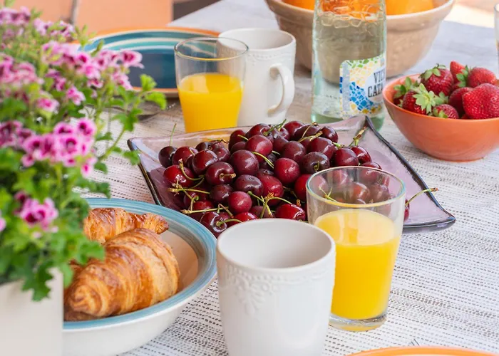 Апартаменты Charming Garden En 